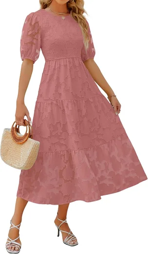 Woman in a dusty rose textured tiered midi dress with puff sleeves, product photo