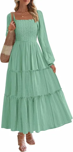 Woman in a sage green long-sleeve ruffled tiered maxi dress, product photo